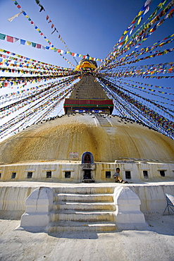 Buddhist stupa known as Boudha at Bodhanath, Kathmandu, Nepal. Taken at Lhosar, the Tibetan new year, hence the abundance of new prayer flags.