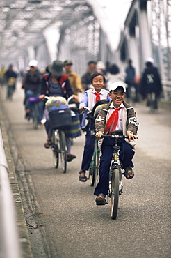 Children on bicycles, Hue, Vietnam, Indochina, Southeast Asia, Asia