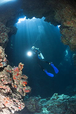 Scuba Diver inside Cave, Zabargad, Red Sea, Egypt