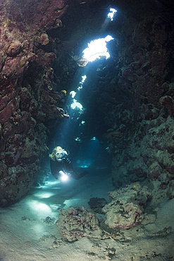 Scuba Diver inside Cave, Zabargad, Red Sea, Egypt