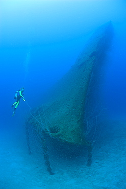 Diver at Bow of USS Arkansas Battleship, Marshall Islands, Bikini Atoll, Micronesia, Pacific Ocean