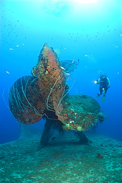 Diver at Propeller of HIJMS Nagato Battleship, Marshall Islands, Bikini Atoll, Micronesia, Pacific Ocean