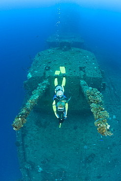 Diver and Twin 8-inch 55 caliber Gun on USS Saratoga, Marshall Islands, Bikini Atoll, Micronesia, Pacific Ocean