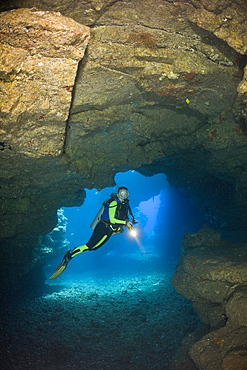 Diver at Caves of Lava Tubes, Cathedrals of Lanai, Maui, Hawaii, USA