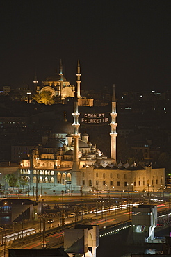 New Mosque Yeni Cami with Galata Bridge in Front and Nuru Osmaniye Mosque in Background, Istanbul, Turkey