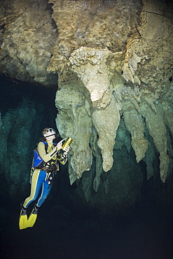 Diver in Chandelier Dripstone Cave, Micronesia, Palau