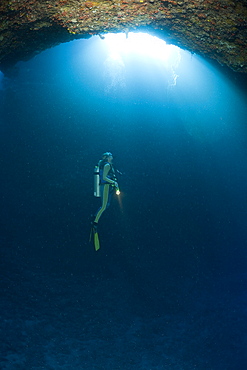 Diver in Blue Hole Cave, Micronesia, Palau