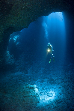 Diver in Blue Hole Cave, Micronesia, Palau