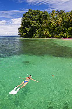 Snorkeling in Lagoon of Ahe Island, Cenderawasih Bay, West Papua, Indonesia, Southeast Asia, Asia