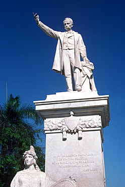 A statue of Jose Marti (poet and martyr of the Cuban independence movement) in the Plaza Marti in the town of Cienfuegos, Cienfuegos Province, Cuba