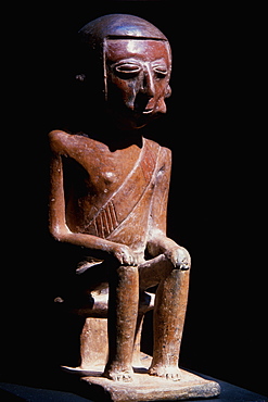 Carchi Culture a 'Coquero' ceramic funerary figure chewing coca, in the collection of the Banco Central de Ecuador, Quito, North Coast, Ecuador