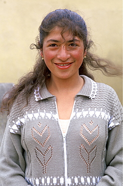 Attractive and modern indian girl near Canar north of Cuenca and home of the Canari Indians, Quito, Ecuador 