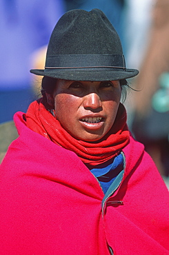 Saquisili south of Quito is one of Latin America's most important indigenous markets woman in brightly colored traditional dress, Quito, Ecuador