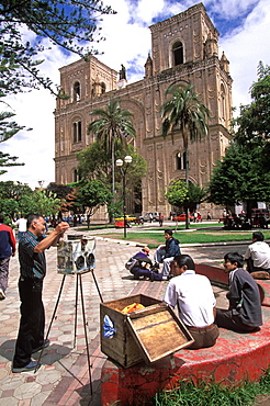 Cuenca World Heritage City & Ecuador's third largest city, famous for its colonial architecture Cathedral and photographers in Calderon Park, Highlands, Ecuador