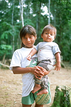 Amazon River Basin Cuyabeno River (Amazon tributary) young girl with brother in rural home, Oriente, Ecuador