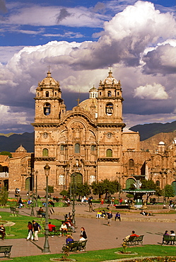 Ancient capital of the Incas the Plaza de Armas in the colonial center of the city with the baroque La Compania Church, c1571, Cuzco, Highlands, Peru