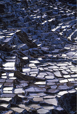 Shallow ponds where the Incas collected salt left by evaporation Salinas is located above the Sacred Valley of the Incas near Cuzco, Highlands, Peru