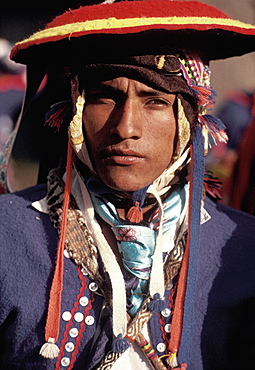 Inti Raymi spectator in traditional dress during the Incan Festival of the Sun, held at Sacsayhuaman, above Cuzco on June 24th, Peru