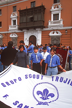 A colonial city on Peru's north coast the Tribute to the Flag Parade on Plaza de Armas boy and girl scout groups, Trujillo, Peru