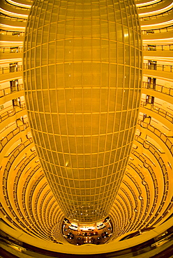 View from the Jin Mao building looking down to the 55th floor, which is the atrium of the Grand Hyatt Hotel, Shanghai, China, Asia