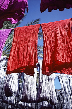 Red dyed cloth and silk drying, Marrakech, Morocco, North Africa, Africa