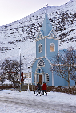 Traditional wooden church, built in 1922, at Seydisfjordur, a town founded in 1895 by a Norwegian fishing company, now main ferry port to and from Europe in the East Fjords, Iceland, Polar Regions