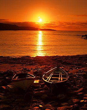 Boats on shore of Nor Wick on the northeast tip of the island, Unst, Shetland Islands, Scotland, United Kingdom, Europe