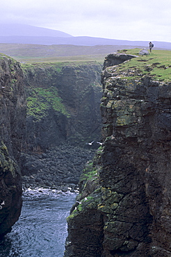 Eshaness basalt cliffs, Calder's Geo, ancient volcanic crater, coast deeply eroded with caves, blowholes and stacks, Northmavine, Shetland Islands, Scotland, United Kingdom, Europe