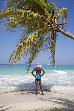 Jamaican woman on beach, Negril, Jamaica, West Indies, Caribbean, Central America