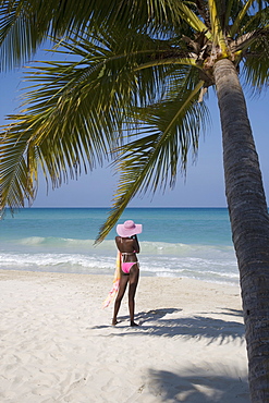 Jamaican woman on beach, Negril, Jamaica, West Indies, Caribbean, Central America