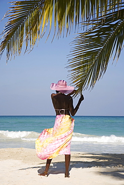 Jamaican woman on beach, Negril, Jamaica, West Indies, Caribbean, Central America