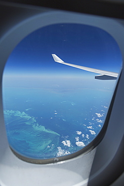 Airplane flying over Bahamas sand banks, West Indies, Central America