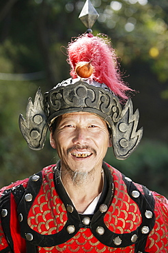 Chinese man with old costume, Great Wall at Mutianyu, Beijing, China, Asia