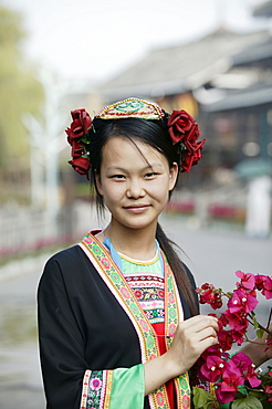 Young woman of Yao Minority mountain tribe in traditional costume, Li River, Yangshuo, Guangxi Province, China, Asia