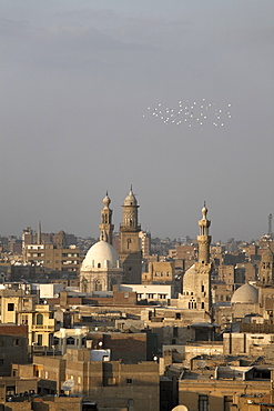 Minarets tower over Islamic Cairo and the area of Khan al-Khalili, Cairo, Egypt, North Africa, Africa