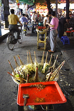 Skewers cook in a Sichuanese hotpot, Chengdu, China, Asia