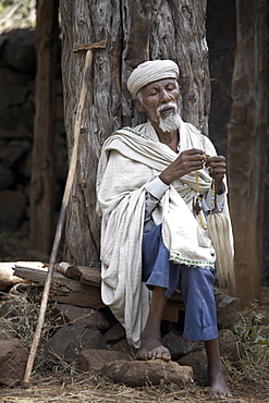 A priest prays at the monastery of Ura Kidane Meret, on Lake Tana, Ethiopia, Africa