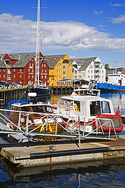 Boats and warehouses on Skansen Docks, Tromso City, Troms County, Norway, Scandinavia, Europe