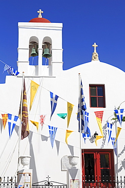 Church with flags in Mykonos Town, Mykonos Island, Cyclades, Greek Islands, Greece, Europe