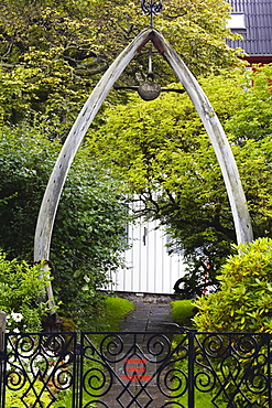 Whale bones in garden, City of Torshavn, Faroe Islands, Kingdom of Denmark, Europe