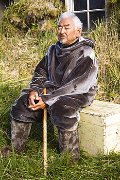 Native man wearing seal skin clothing, Museum in Nanortalik Port, Island of Qoornoq, Province of Kitaa, Southern Greenland, Kingdom of Denmark, Polar Regions