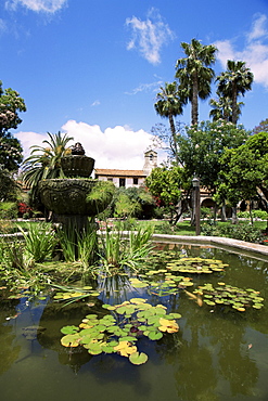 Lily pond and fountain, Mission San Juan Capistrano, Orange County, California, United States of America, North America