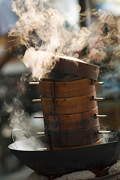 Steaming  baskets on wok, Leshan, Sichuan, China, Asia