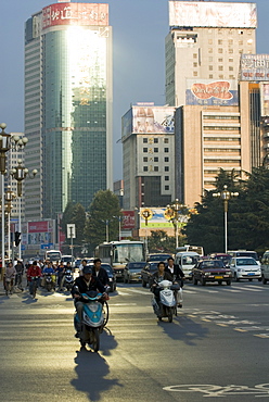 Early morning traffic, Kunming, Yunnan, China, Asia