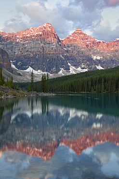 Early morning reflections in Moraine Lake, Banff National Park, UNESCO World Heritage Site, Alberta, Rocky Mountains, Canada, North America