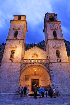 People gathered outside St. Tryphon's Cathedral in the evening, Kotor, UNESCO World Heritage Site, Montenegro, Europe