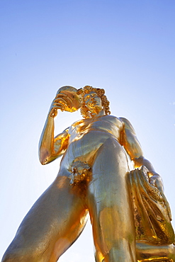 Golden statue on the Grand Cascade at Peterhof Palace, St. Petersburg, Russia, Europe