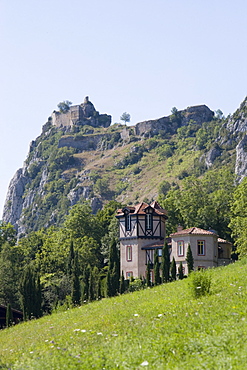 House and Cathar castle, Roquefixade, Ariege, Midi-Pyrenees, France, Europe