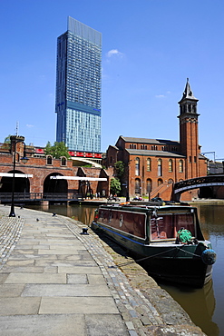 Canal boat at Castlefield with the Beetham Tower in the background, Manchester, England, United Kingdom, Europe