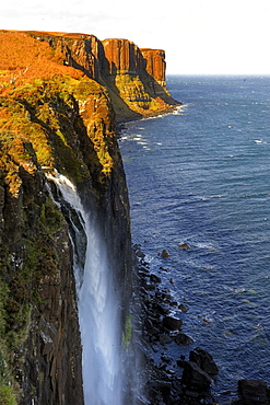 Waterfall at Kilt Rock, famous basaltic cliff near Staffin, Isle of Skye, Inner Hebrides, Scotland, United Kingdom, Europe